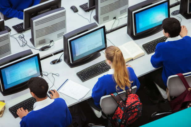 Children working on computers in school