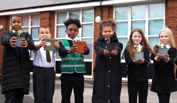 Pupils at Goldsmith Primary Academy with some of their plants